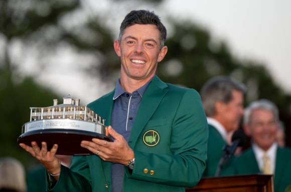 Rory McIlroy lifts the Masters trophy