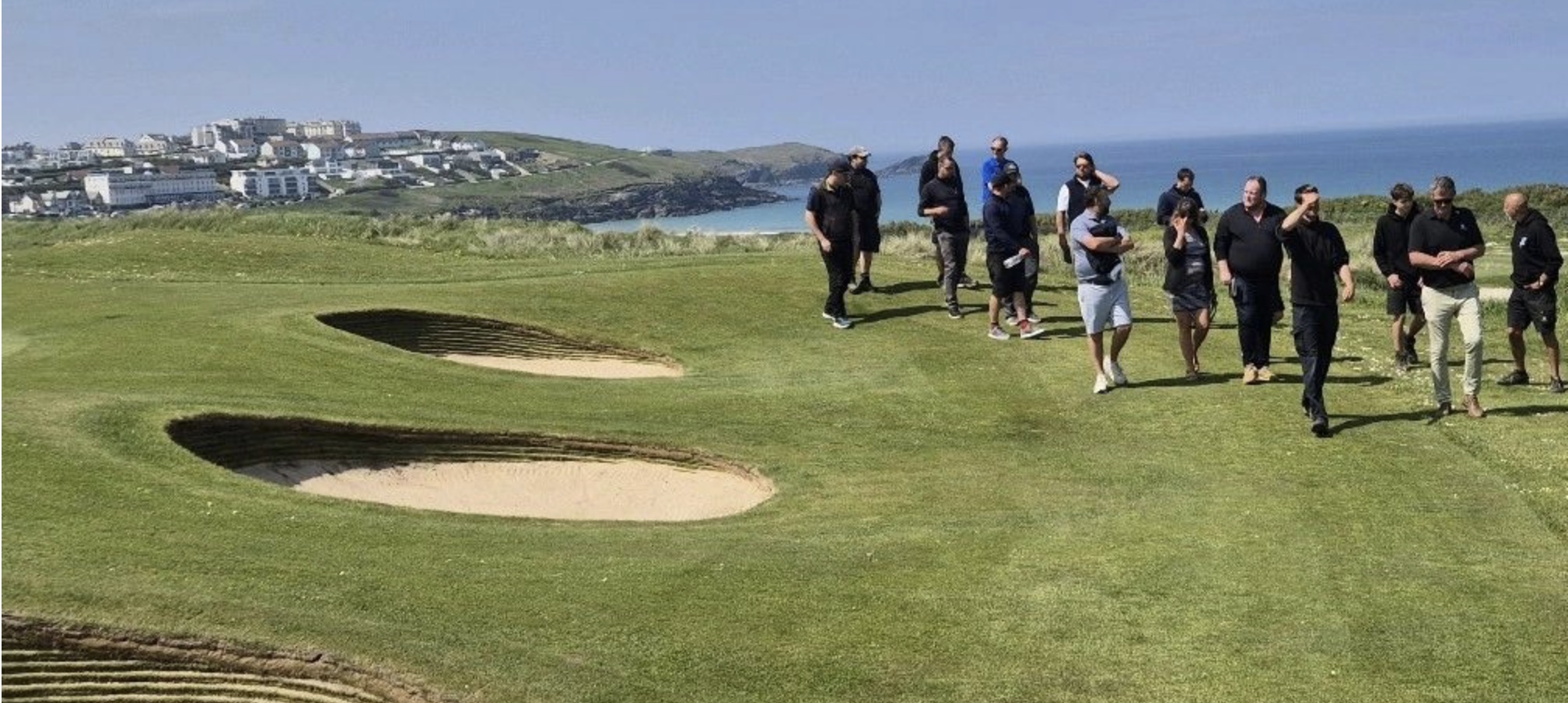 Visiting greenkeepers enjoy a tour of Newquay Golf Club's recently restored bunkers in the company of EcoBunker's team