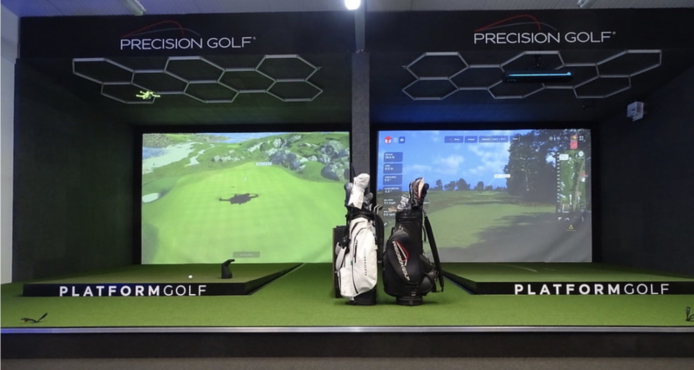 The two hitting bays at Precision Golf are fitted with Platform Golf's TruSlope tilting platforms