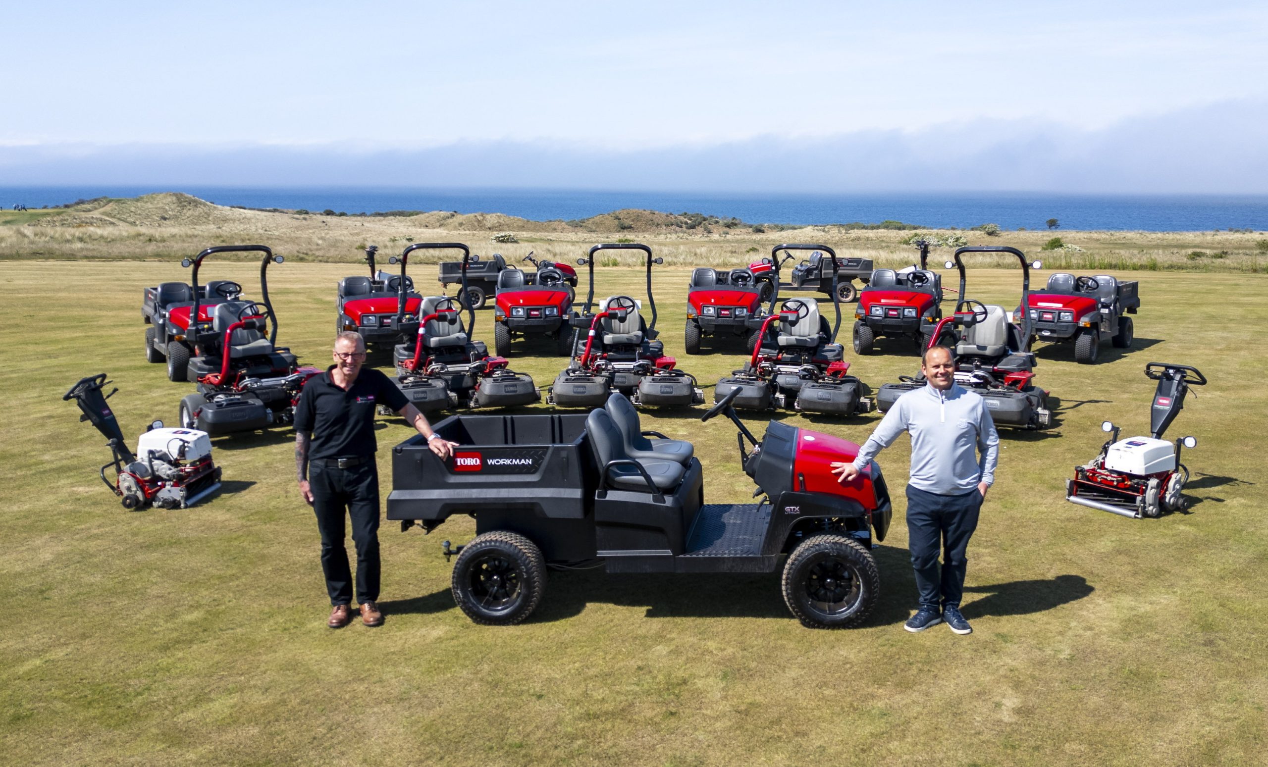 Gullane Course Manager Paul Armour (right) with Toro distributor Reesink Scotland’s Neil Mackenzie and the fleet of new Toro machinery