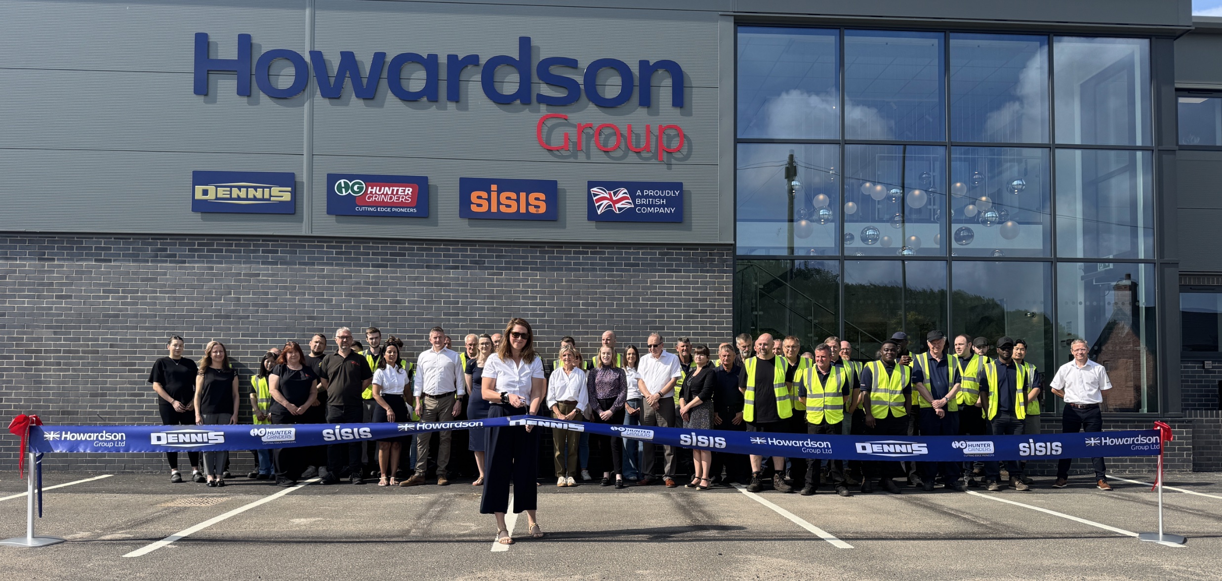 Howardson Group Managing Director Megan Oliver officially opens the company's new office and warehouse facility 
