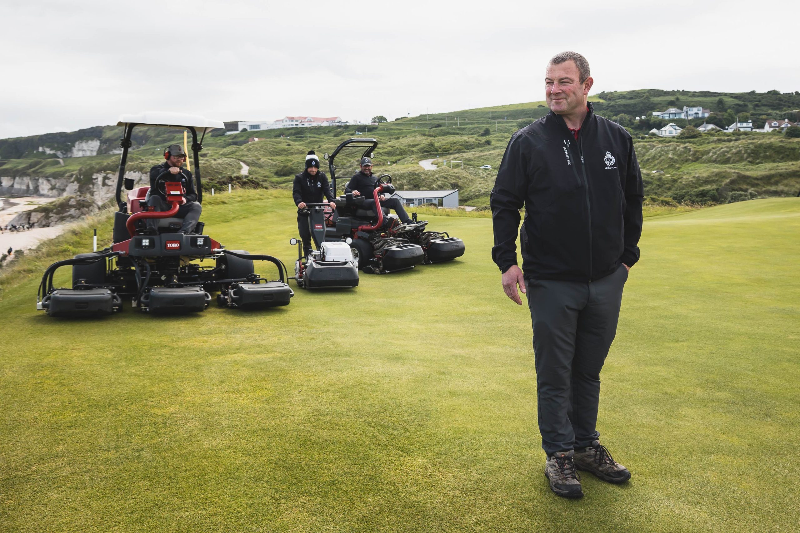 Graeme Beatt, Course Manager at Royal Portrush with members of his greenkeeping team and their Toro mowers