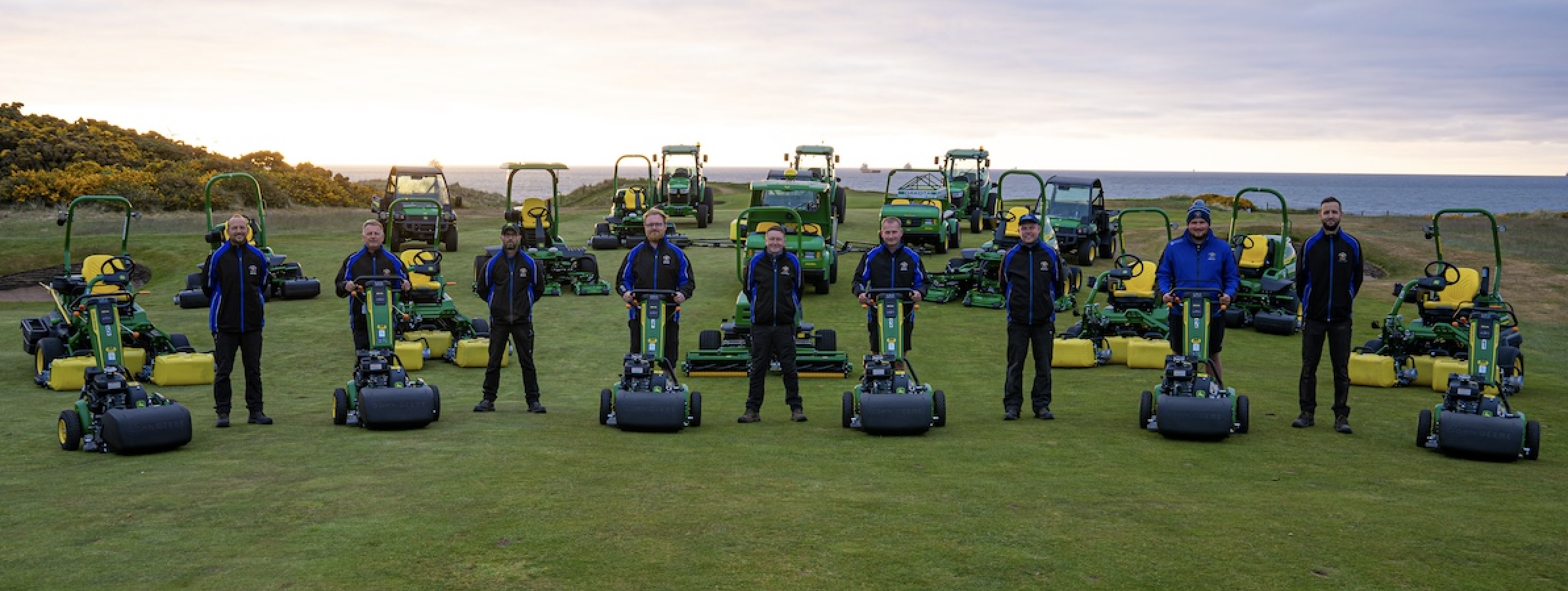 The greenkeeping team at Royal Aberdeen with the John Deere machinery fleet