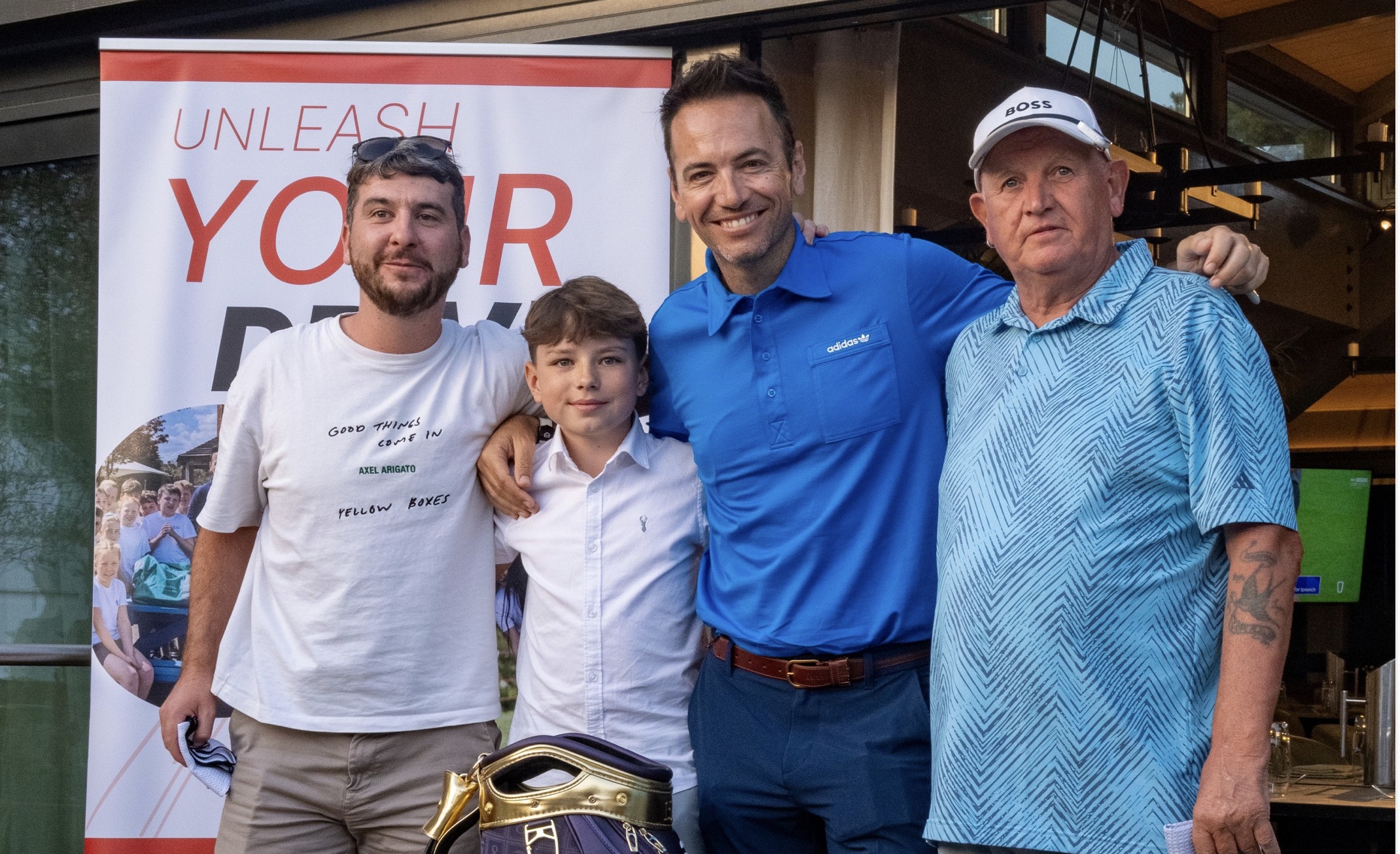 Golf Foundation President Nick Dougherty with Unleash Your Drive winners Paul McHugh, Thomas Peachey and Colin McGee