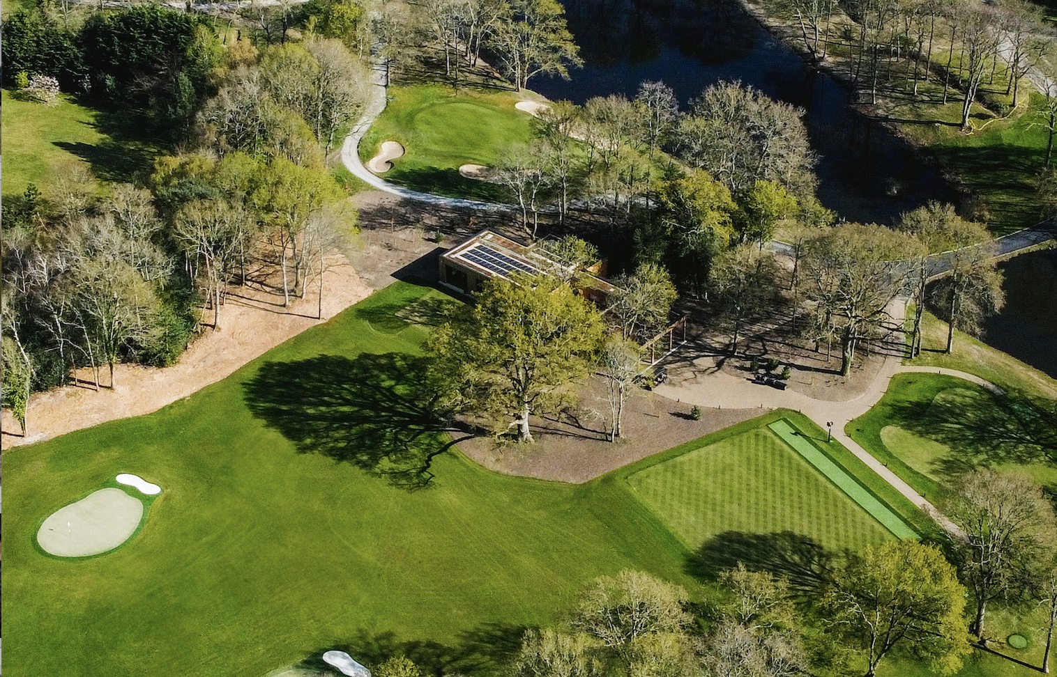 An aerial view of the Golf Academy building, with its 300-yard range,  short game practice are and academy course