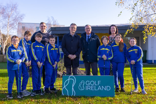 Patrick O’Donovan, Ireland’s Minister for Tourism, Culture, Arts, Gaeltacht, Sport and Media, pictured alongside Golf Ireland CEO Mark Kennelly (right) and Munster Golf in the Community Officer Robert Cussen, along with a teacher and pupils from Gaelscoil O Doghair in Newcastle West, County Limerick at a golf taster session (Photo: Inpho Sports / Tom O'Hanlon)
