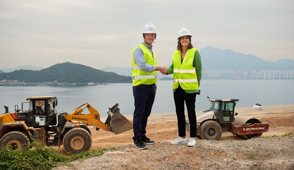 Dean Nelson, General Manager of Plover Cove Golf Club, and Vicky Jones, Managing Director of 54 APAC, at the construction site of Plover Cove Golf Club - a groundbreaking golf development in Hong Kong.