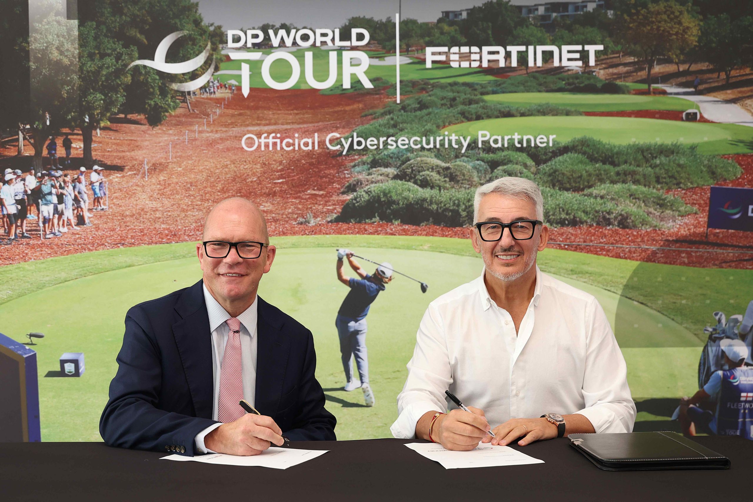 Guy Kinnings, CEO of the DP World Tour and Joe Sarno, EVP International Sales at Fortinet (pic by Getty Images)