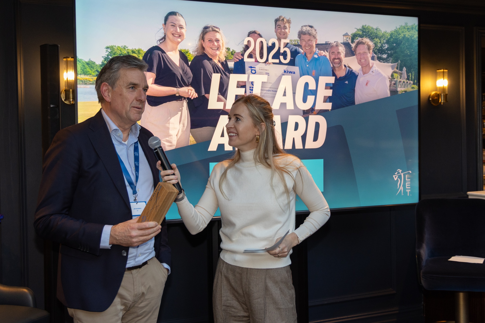 Jan Van Merwijk accepts the LET Ace Award on behalf of Jelle Sprée, Manager of Events at the Netherlands Golf Federation
