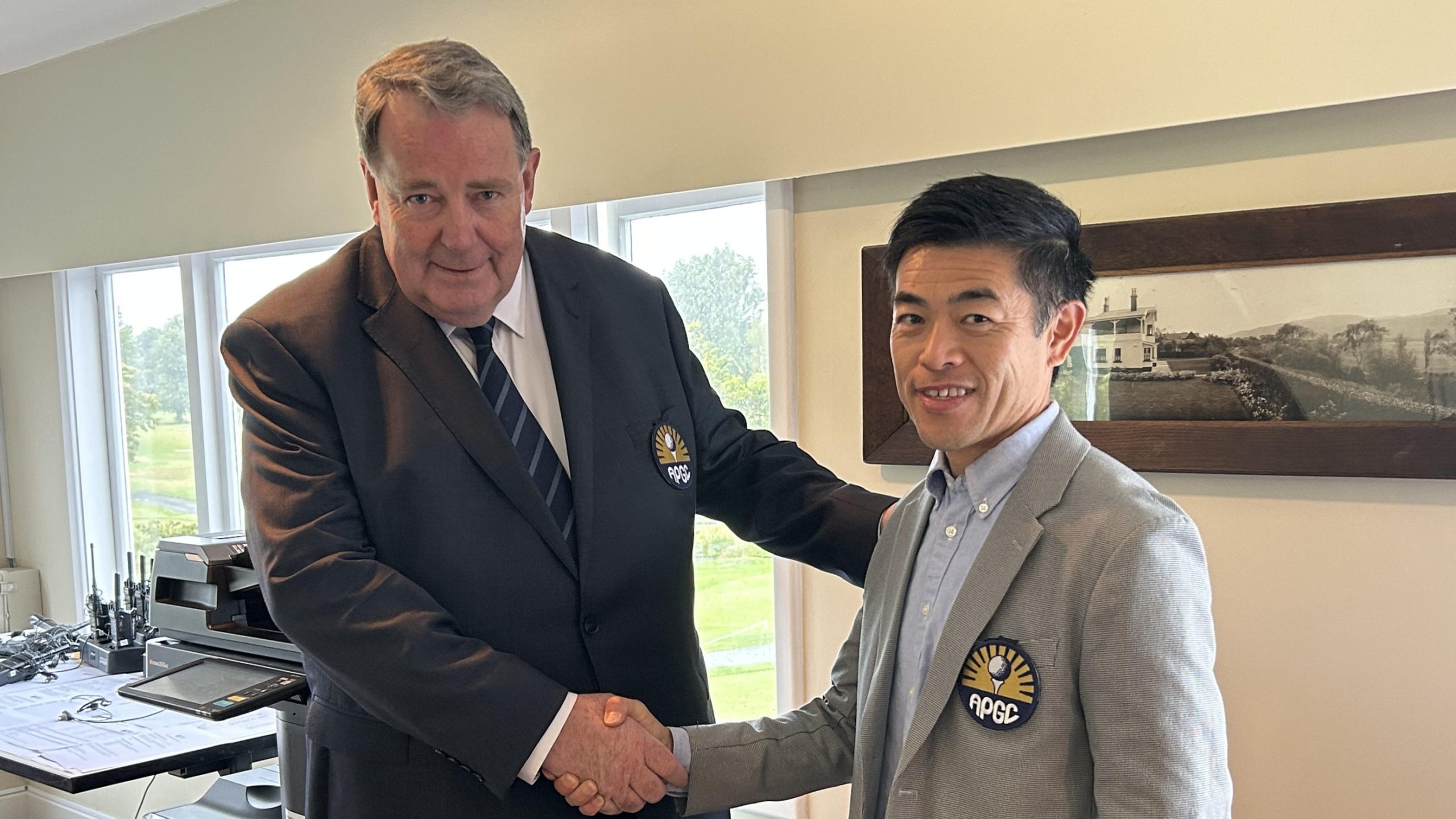 Nick Shan is congratulated on his appointment by APGC Chairman Philip Hassall