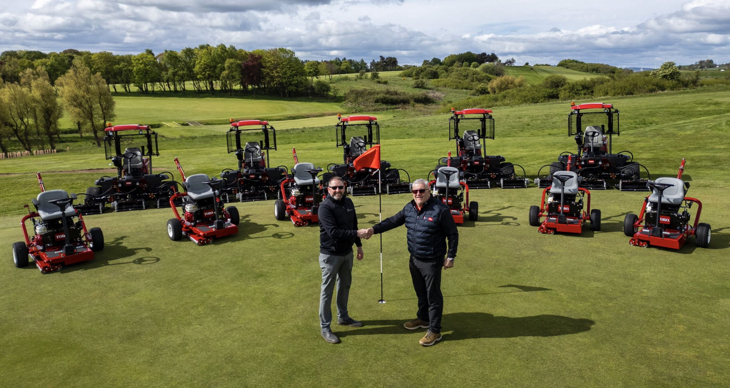 David Gray, Golf Courses Manager for Fife Golf Trust, left, with John Rankin, Area Sales Manager for Reesink Scotland and the Toro Reelmaster and Toro GreensPro included in the order