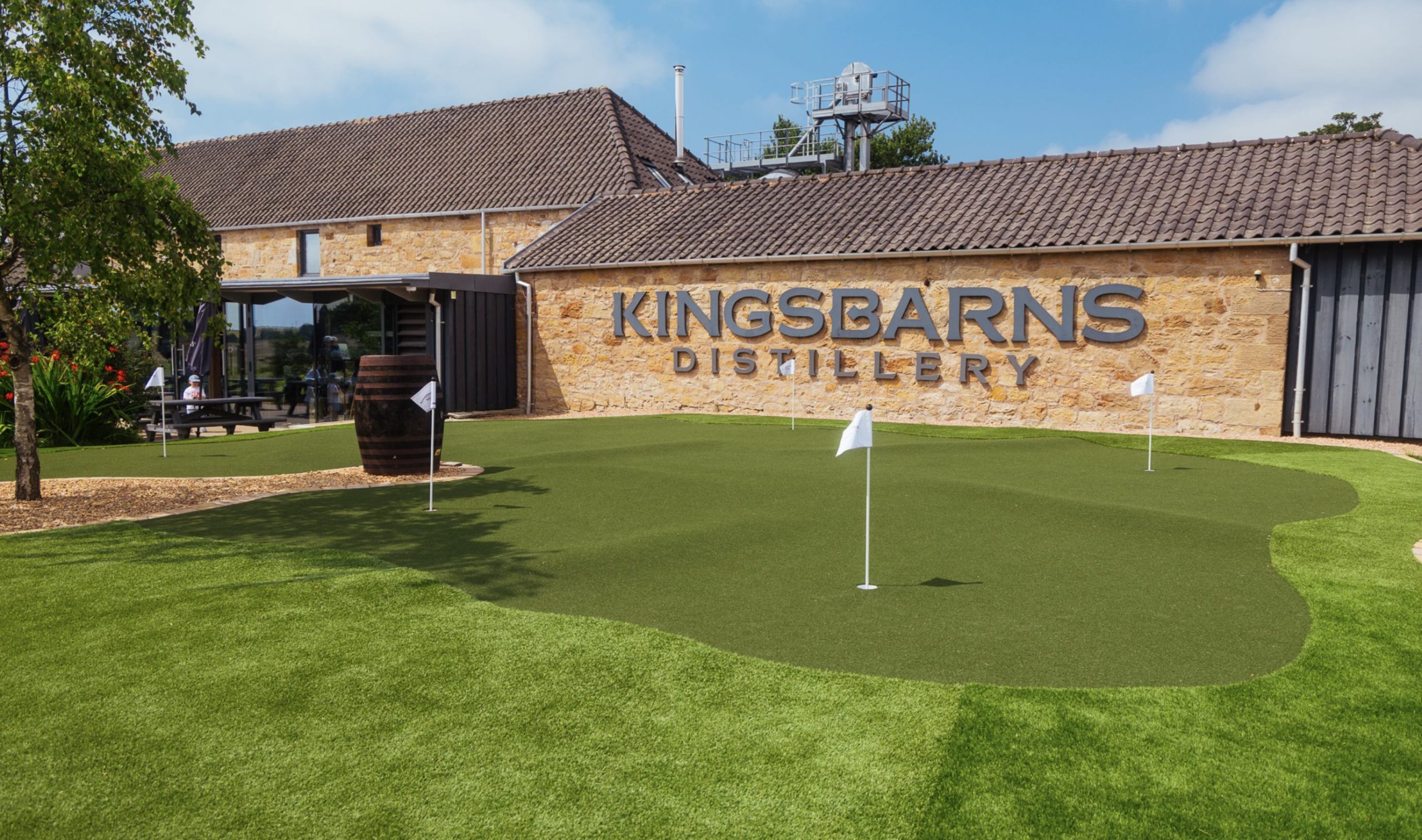 The putting green outside the Kingsbarns Distillery